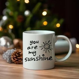 you are my sunshine | Charming White 11oz Ceramic Mug. Boasts a classic look. Measures 14x11x10. Crafted from